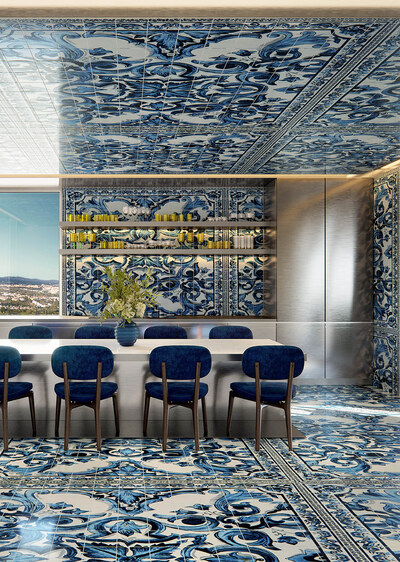 A dining room at Design Hills, walled and floored in blue-and-white Sicilian maiolica.