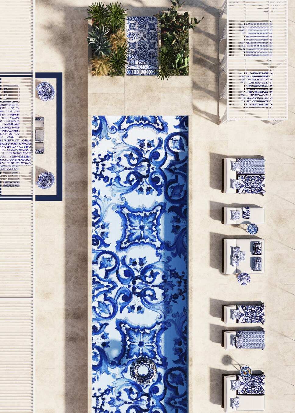 The pool deck from above, its Blu Mediterraneo maiolica running the length of the water.